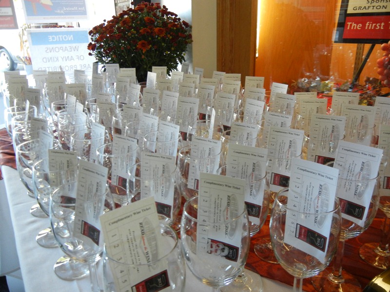 Attendees receive a wine glass with their tickets along with a goody bag.