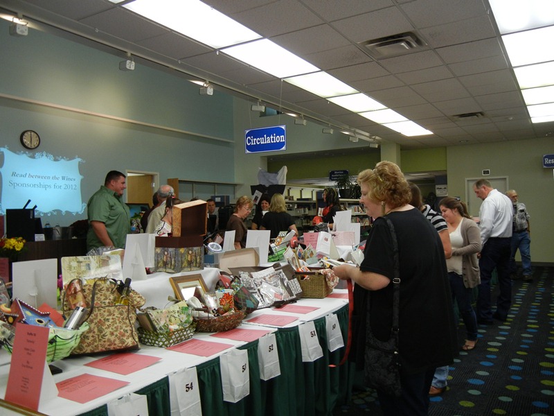 Make sure you take your time browsing through the many raffle baskets on display during Read Between the Wines