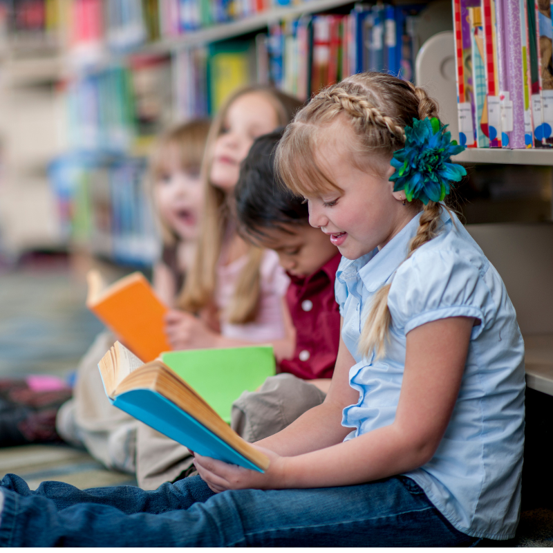 Children reading in the Library